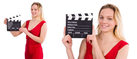 Red dress girl holding clapboard isolated on whiteの写真素材