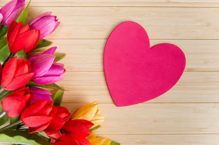 Tulips flowers arranged with copyspace for your textの写真素材