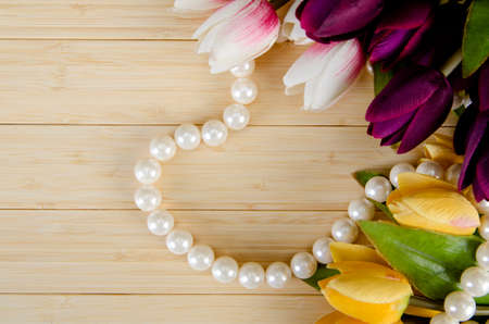 Tulips flowers arranged with copyspace for your textの写真素材