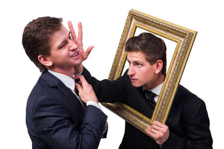 Two twins businessmen arguing with each other isolated on whiteの写真素材