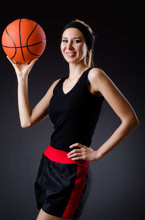Woman with basketball in sport conceptの写真素材