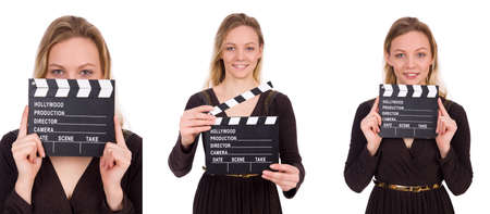 Brown dress girl holding clapperboard isolated on whiteの写真素材