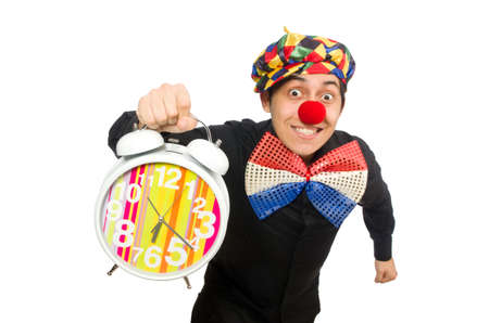 Funny clown with clock isolated on whiteの写真素材