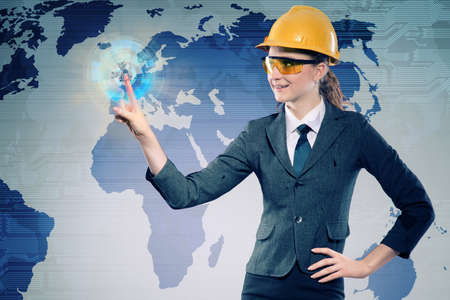 Female construction worker in globalisation conceptの写真素材