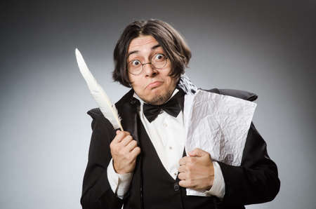 Funny writer with quill in vintage conceptの写真素材