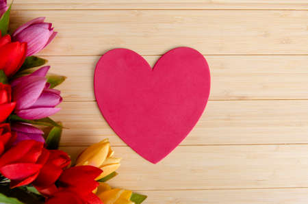 Tulips flowers arranged with copyspace for your textの写真素材