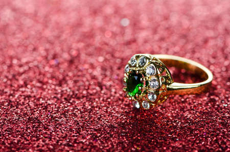 Jewellery ring against shiny background