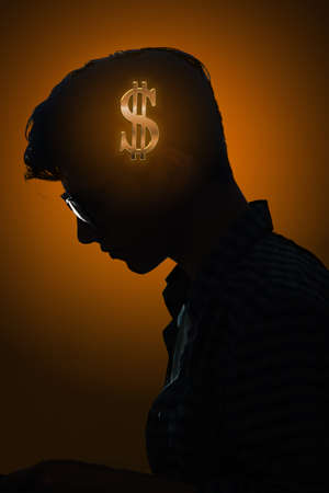 Businessman thinking about money in business conceptの写真素材