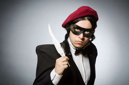 Funny writer with quill in vintage conceptの写真素材