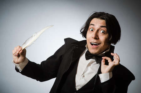 Funny writer with quill in vintage conceptの写真素材