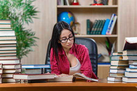 Young female student preparing for college school examsの写真素材