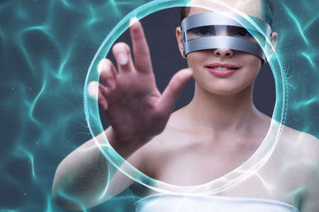 Techno girl pressing virtual buttonsの写真素材