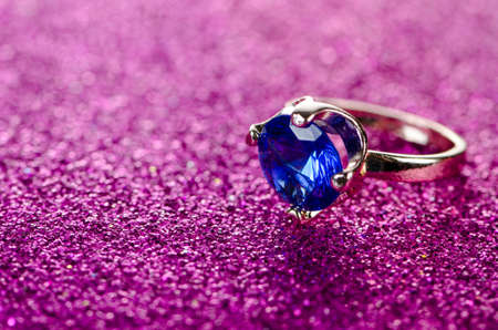 Jewellery ring against shiny backgroundの写真素材