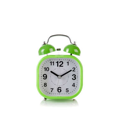 Alarm clock in time concept isolated on whiteの写真素材