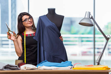 Woman tailor working on new clothingの写真素材