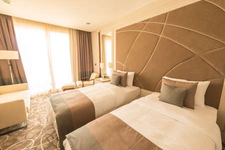 Modern hotel room with big bed