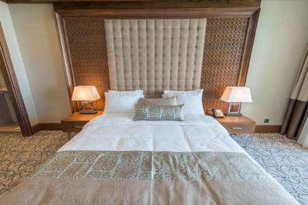 Modern hotel room with big bed