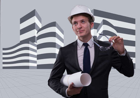 Young architect with drawings in composite conceptの写真素材
