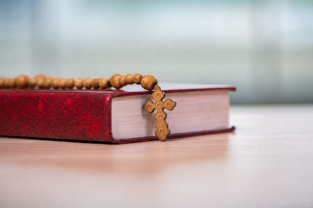 Bible and cross in religious conceptの写真素材