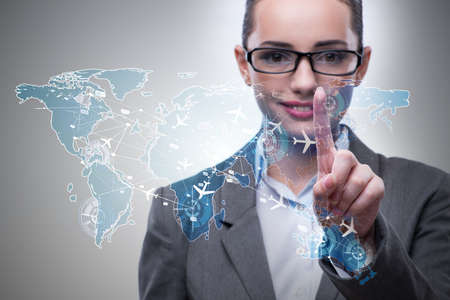 Businesswoman in air transportation conceptの写真素材