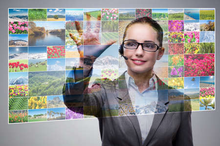 Businesswoman pressing virtual button on nature collage