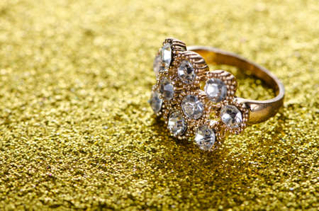 Jewellery ring against shiny backgroundの写真素材