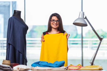 Woman tailor working on new clothingの写真素材