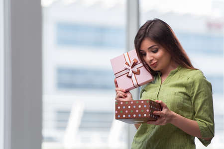 Young woman excited with giftbox