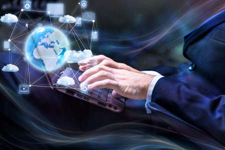 Businessman working with laptop in cloud computing conceptの写真素材