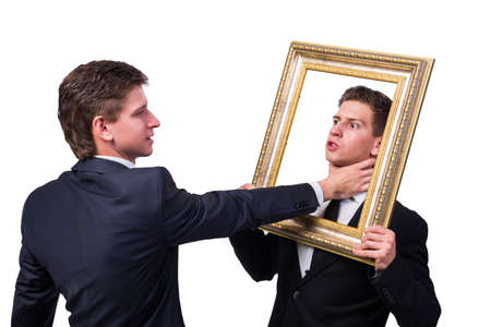 Two twins businessmen arguing with each other isolated on whiteの写真素材