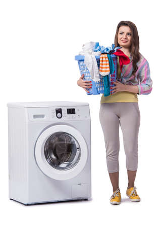 Woman tired after doing laundry isolated on whiteの写真素材