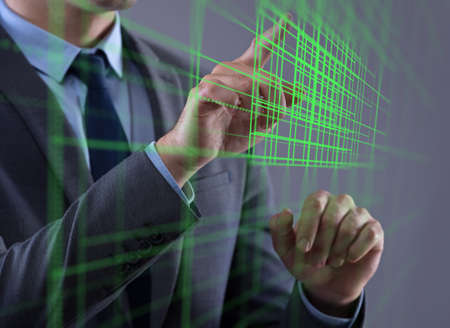Businessman pressing virtual buttons in futuristic concept