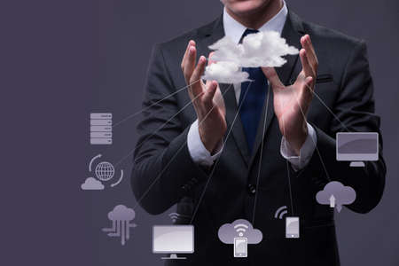 Young businessman in cloud computing conceptの写真素材