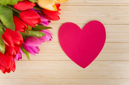 Tulips flowers arranged with copyspace for your textの写真素材