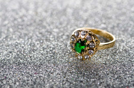 Jewellery ring against shiny backgroundの写真素材