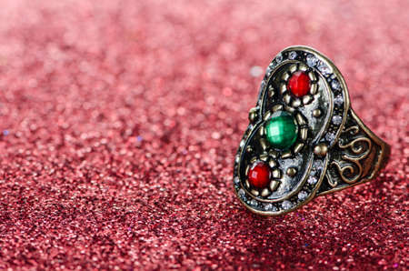 Jewellery ring against shiny backgroundの写真素材