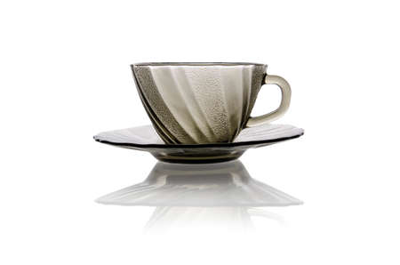 Empty cup and saucer isolated on whiteの写真素材