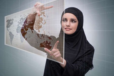 Arab woman in air travel conceptの写真素材