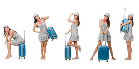 Travelling woman with suitcase isolated on whiteの写真素材