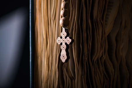 Bible and cross in religious conceptの写真素材