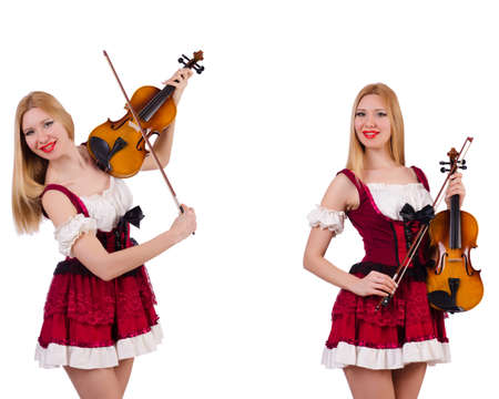 Bavarian girl playing the violin isolated on whiteの写真素材