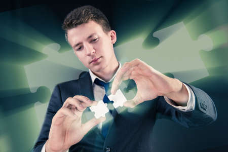 Businessman in business concept with puzzle piece