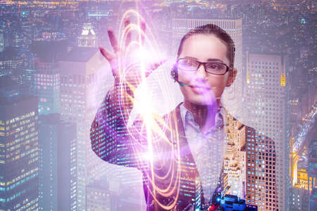 Woman pressing buttons in business conceptの写真素材