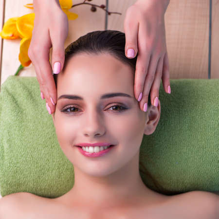 Young woman during massage sessionの写真素材