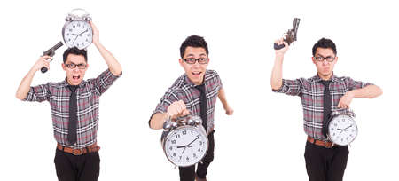 Young man with clock isolated on white