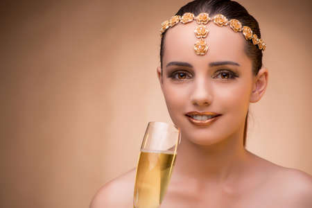 Young woman with champagne glassの写真素材