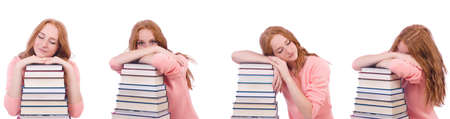 Woman student with stacks of booksの写真素材