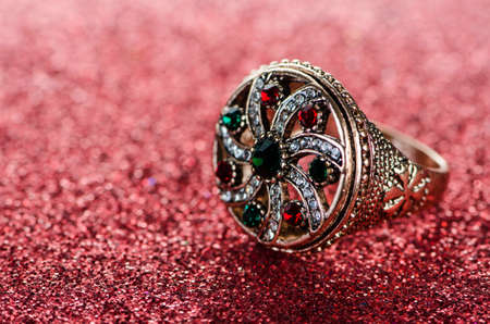 Jewellery ring against shiny backgroundの写真素材