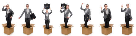 Composite image of woman with boxes on whiteの写真素材