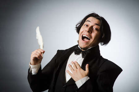 Funny writer with quill in vintage conceptの写真素材